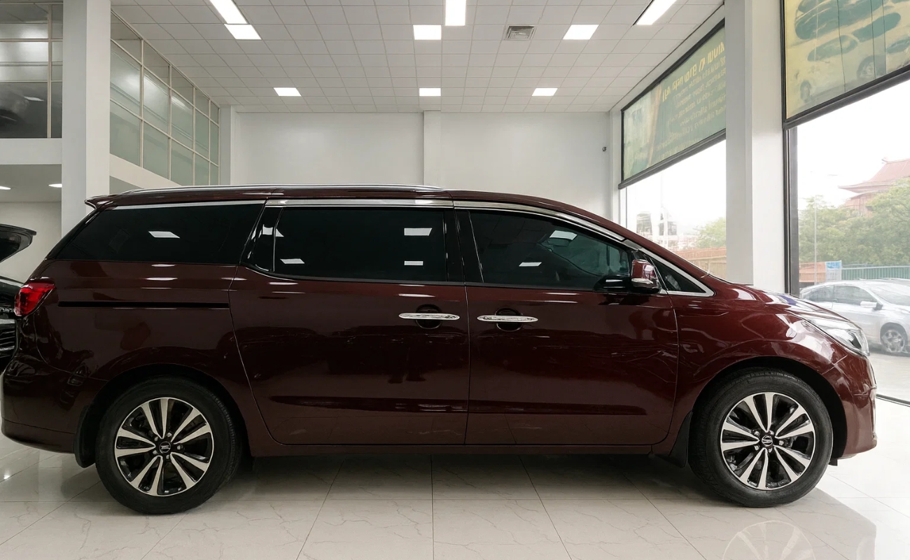 Xe du lịch Hải Phòng đi Chùa Hương - Kia Sedona 7 chỗ màu đỏ mận