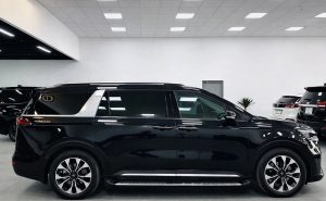 Xe du lịch Hải Phòng đi Serena - Kia Carnival màu đen 7 chỗ